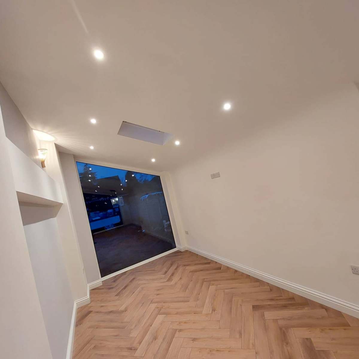 High ceilings, lvt herringbone flooring.